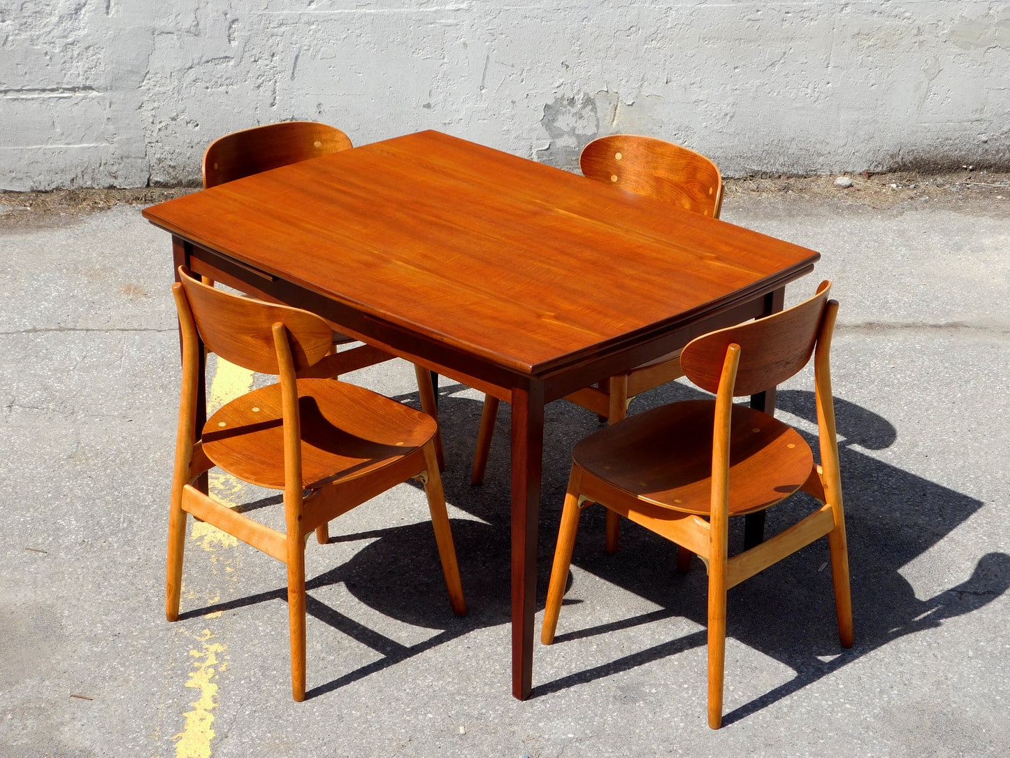 Danish Convex shaped draw-leaf dining table