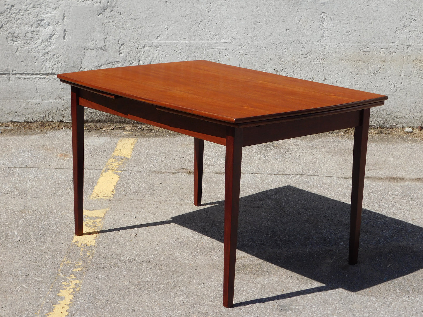 Danish Convex shaped draw-leaf dining table